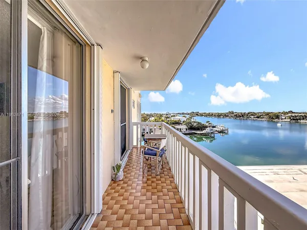 a kitchen with a sink stove and refrigerator