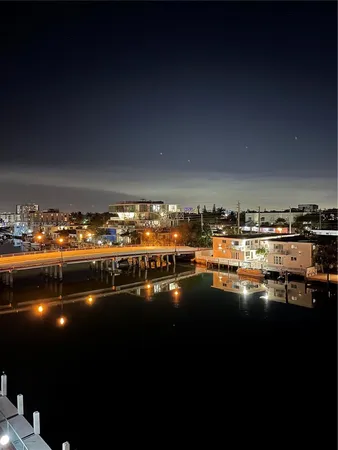 a balcony with furniture and a potted plant