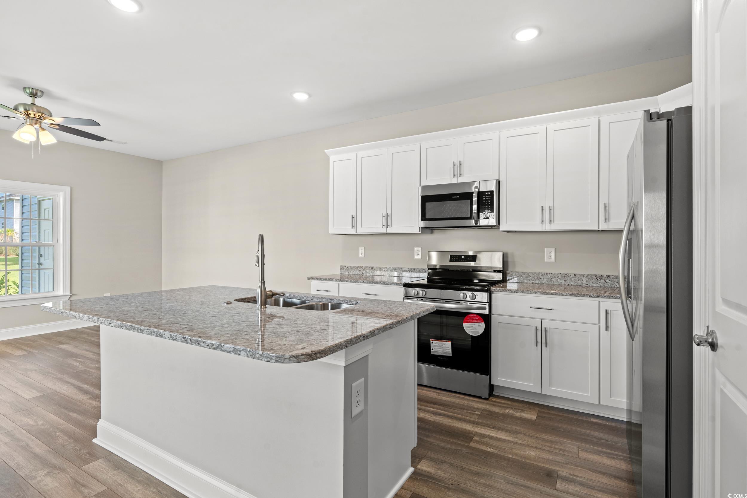344 Kiskadee Loop, Unit F Conway, SC 29526 - Photo 4 of 37 Kitchen with appliances with stainless steel finis