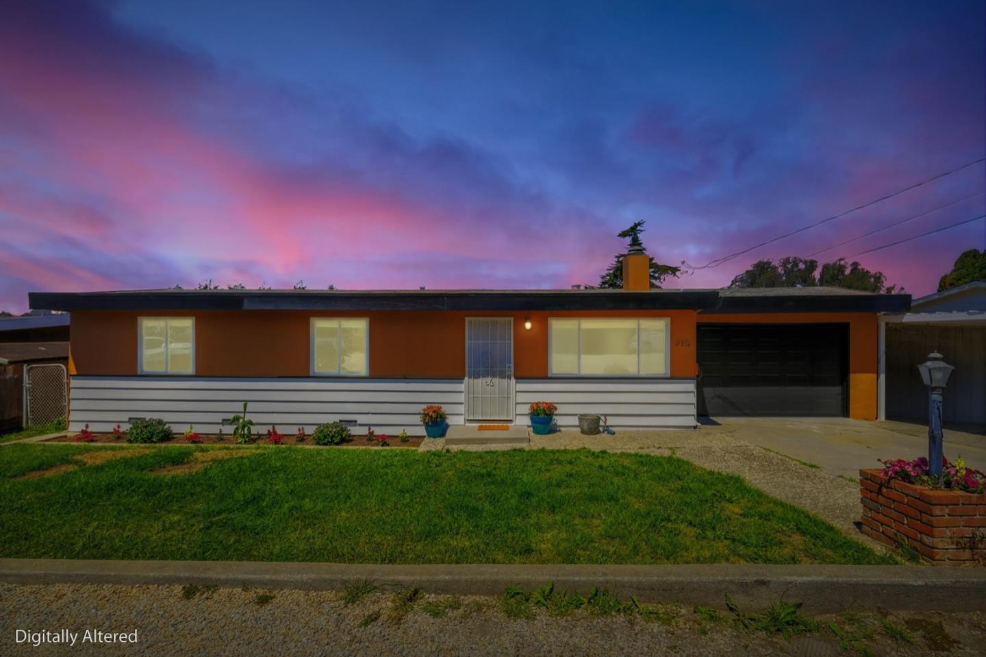 215 Manfre Road Watsonville, CA 95076 - Photo 3 of 36 a front view of a house with a garden and yard