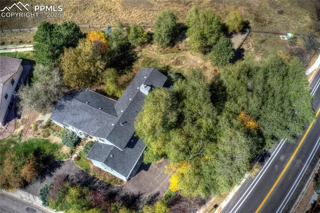 an aerial view of residential house with outdoor space
