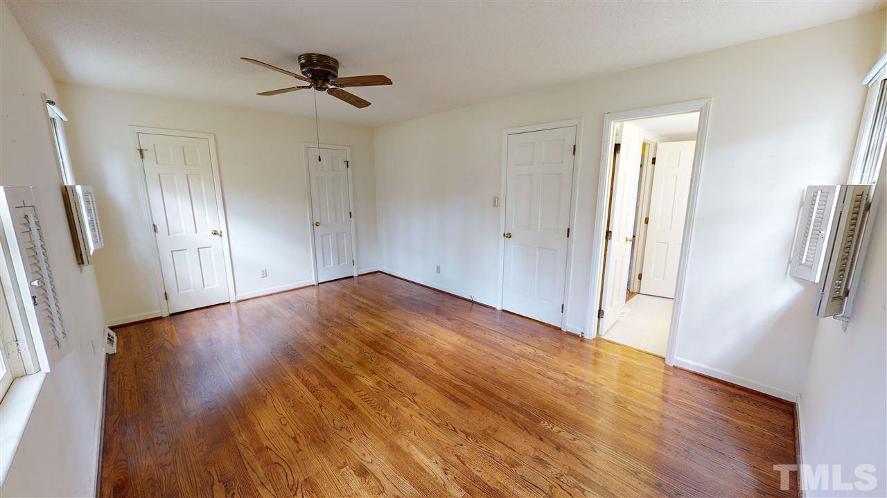 1114 Manchester Drive Raleigh, NC 27609 - Photo 22 of 30 a view of empty room with wooden floor