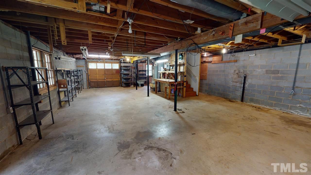 1114 Manchester Drive Raleigh, NC 27609 - Photo 29 of 30 a view of empty room with wooden ceiling