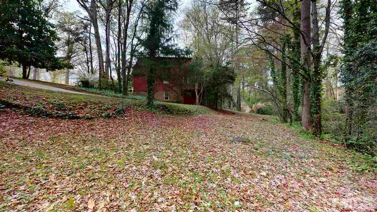 1114 Manchester Drive Raleigh, NC 27609 - Photo 6 of 30 a view of a yard with a tree