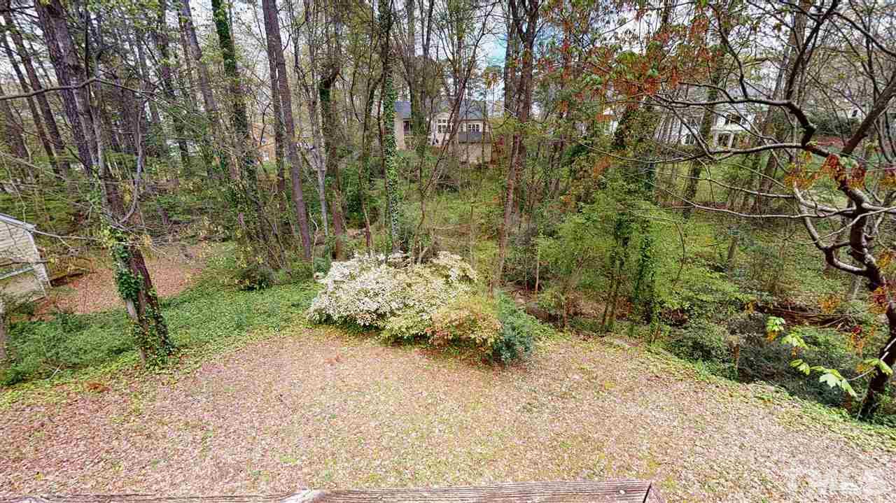 1114 Manchester Drive Raleigh, NC 27609 - Photo 7 of 30 a pathway of a yard