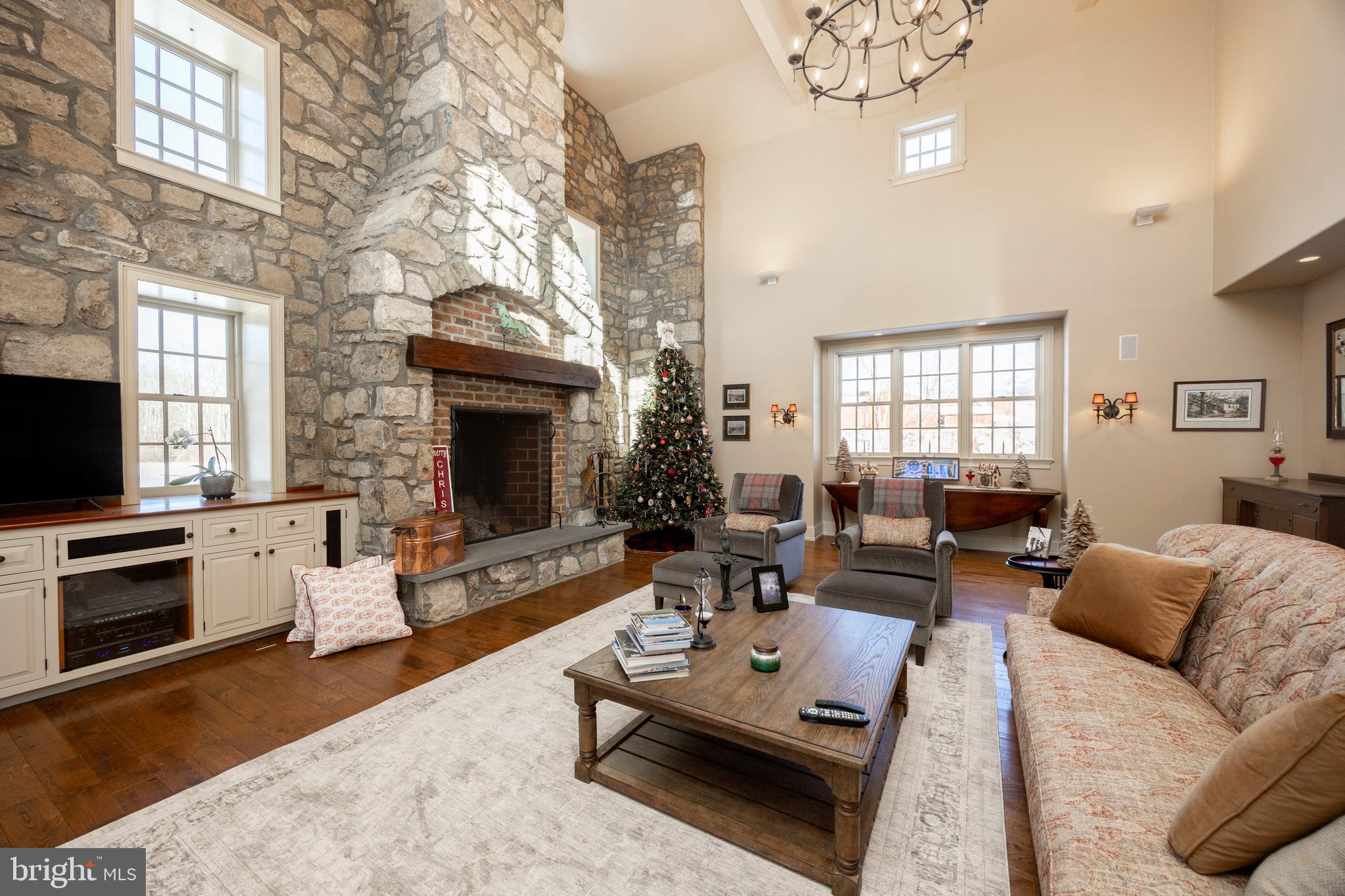 2230 Creek Road Glenmoore, PA 19343 - Photo 13 of 86 a living room with furniture fireplace and flat screen tv