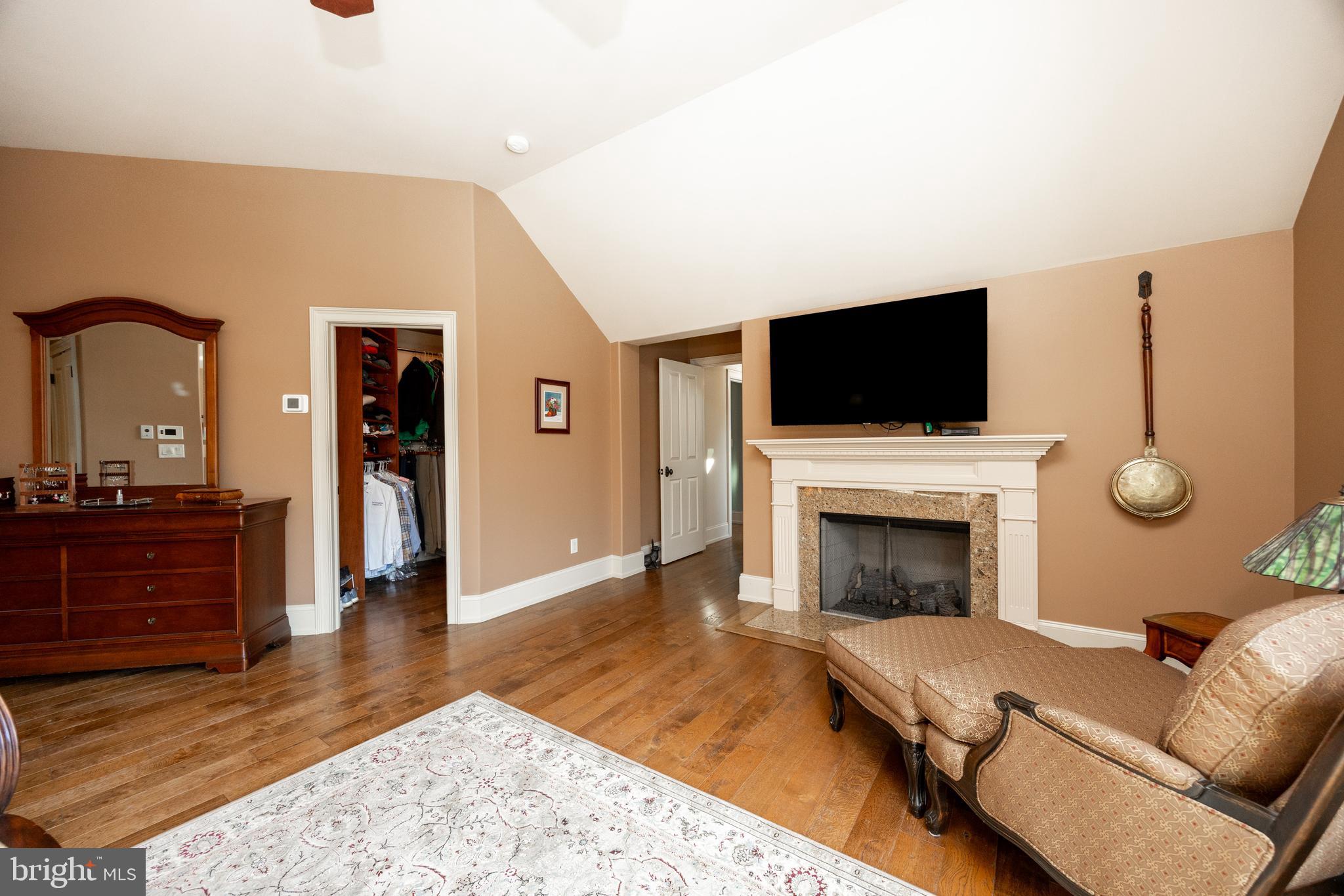 2230 Creek Road Glenmoore, PA 19343 - Photo 28 of 86 a living room with furniture and a fireplace or television