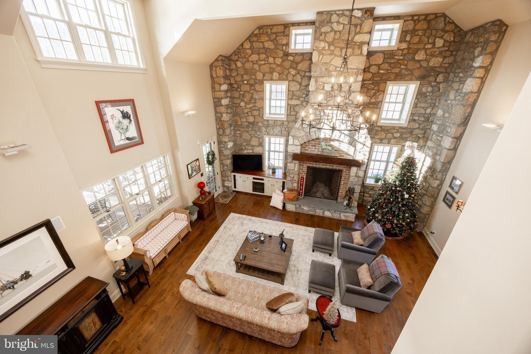 2230 Creek Road Glenmoore, PA 19343 - Photo 33 of 86 a living room with furniture and a fireplace
