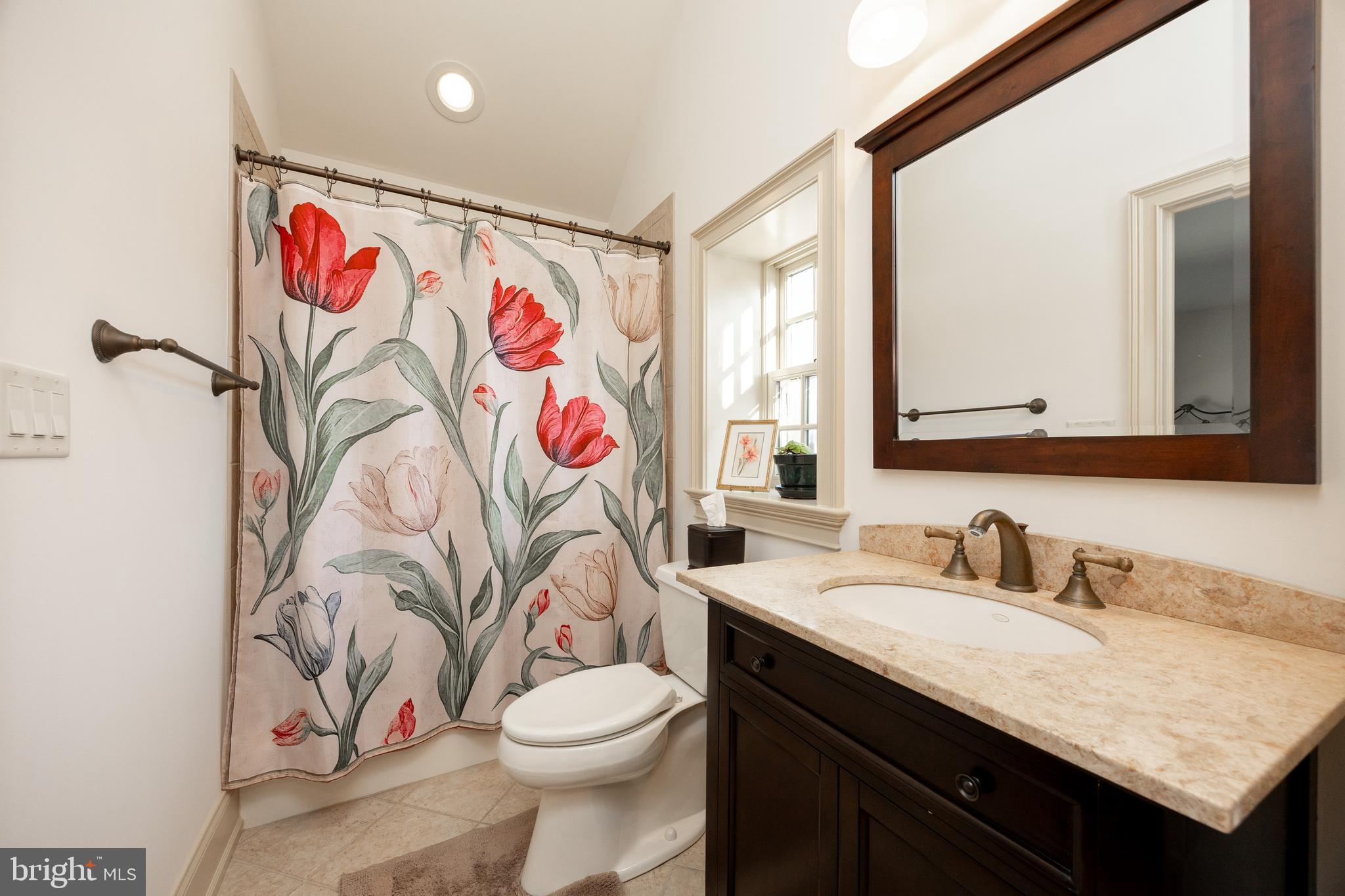 2230 Creek Road Glenmoore, PA 19343 - Photo 40 of 86 a bathroom with a granite countertop sink and a mirror