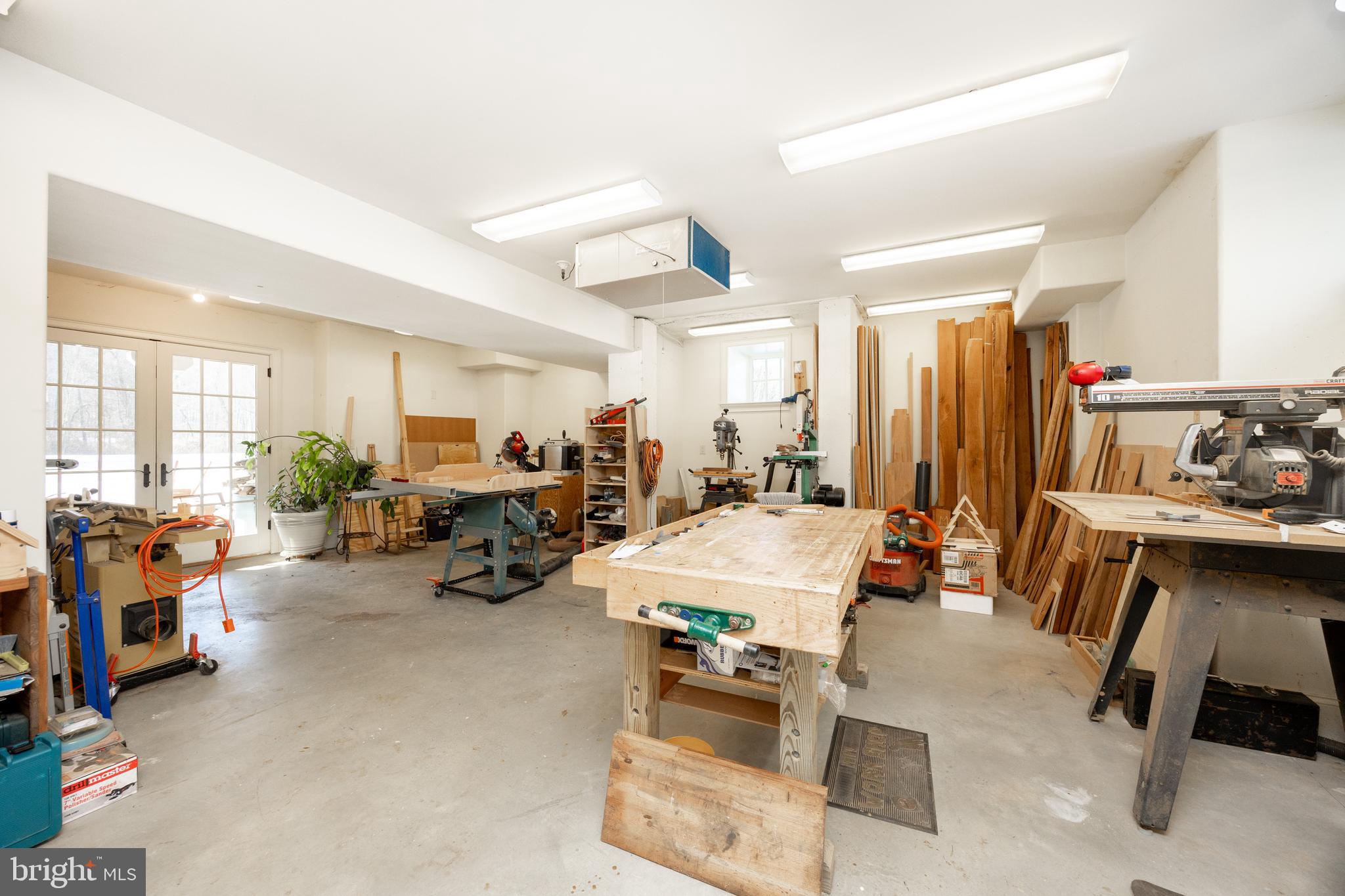 2230 Creek Road Glenmoore, PA 19343 - Photo 50 of 86 a room with furniture and a large window