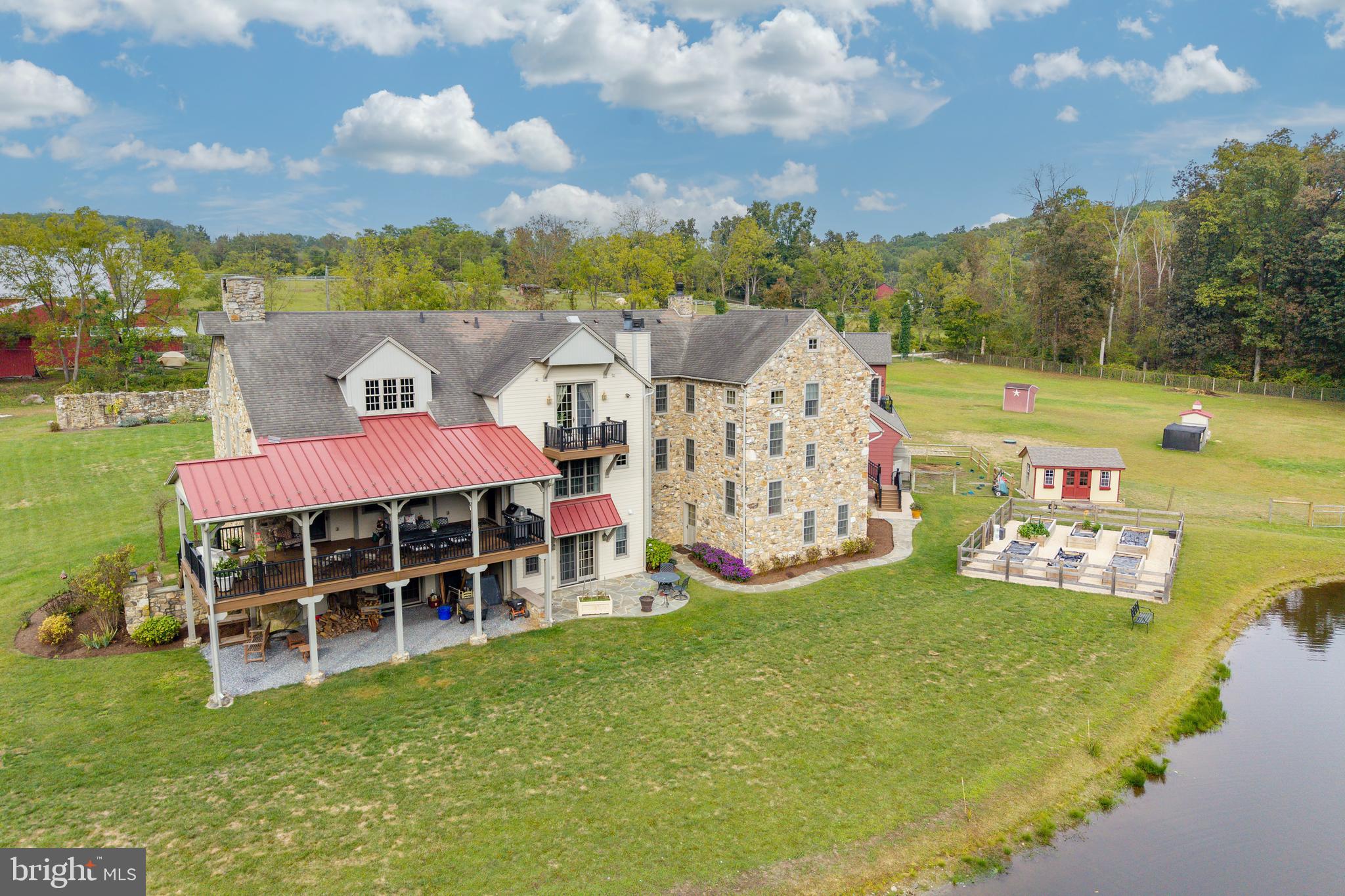 2230 Creek Road Glenmoore, PA 19343 - Photo 58 of 86 a view of a house with a big yard and large trees