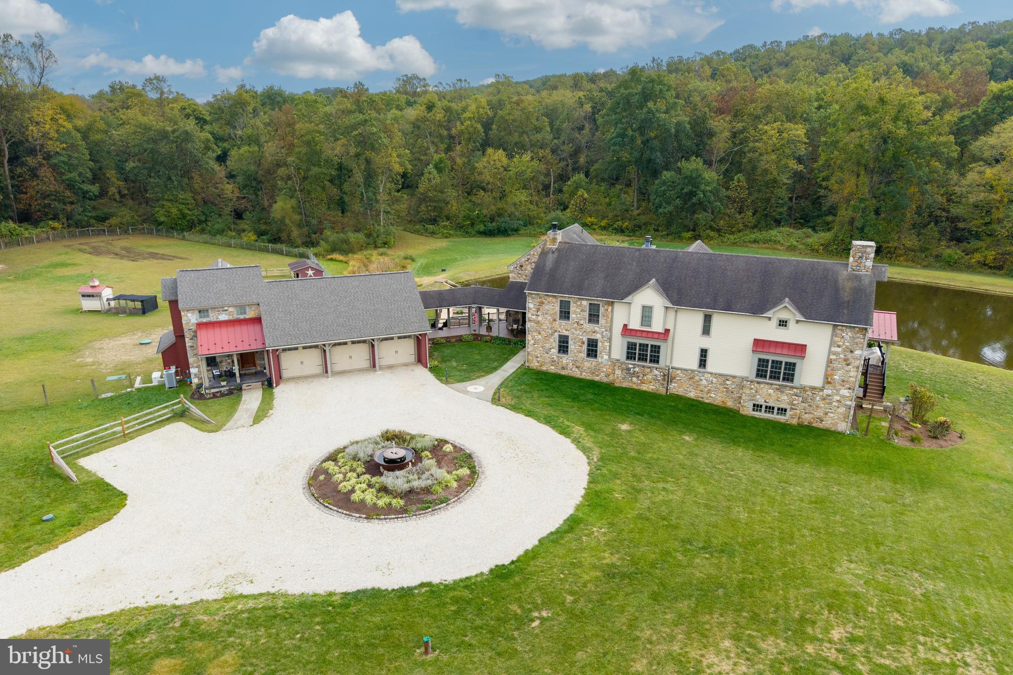 2230 Creek Road Glenmoore, PA 19343 - Photo 65 of 86 an aerial view of a house with swimming pool garden and mountain view