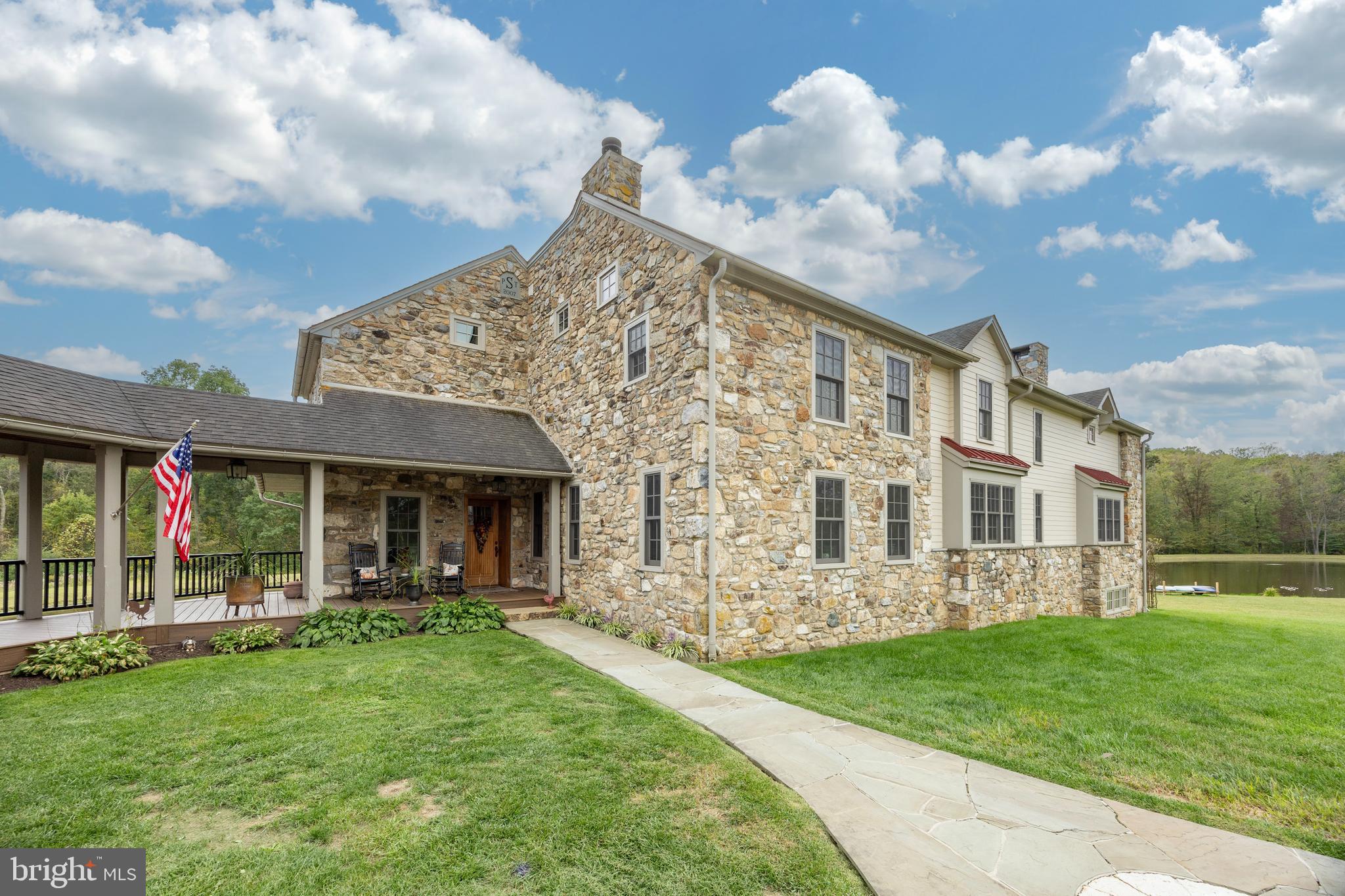 2230 Creek Road Glenmoore, PA 19343 - Photo 67 of 86 a front view of a house with garden