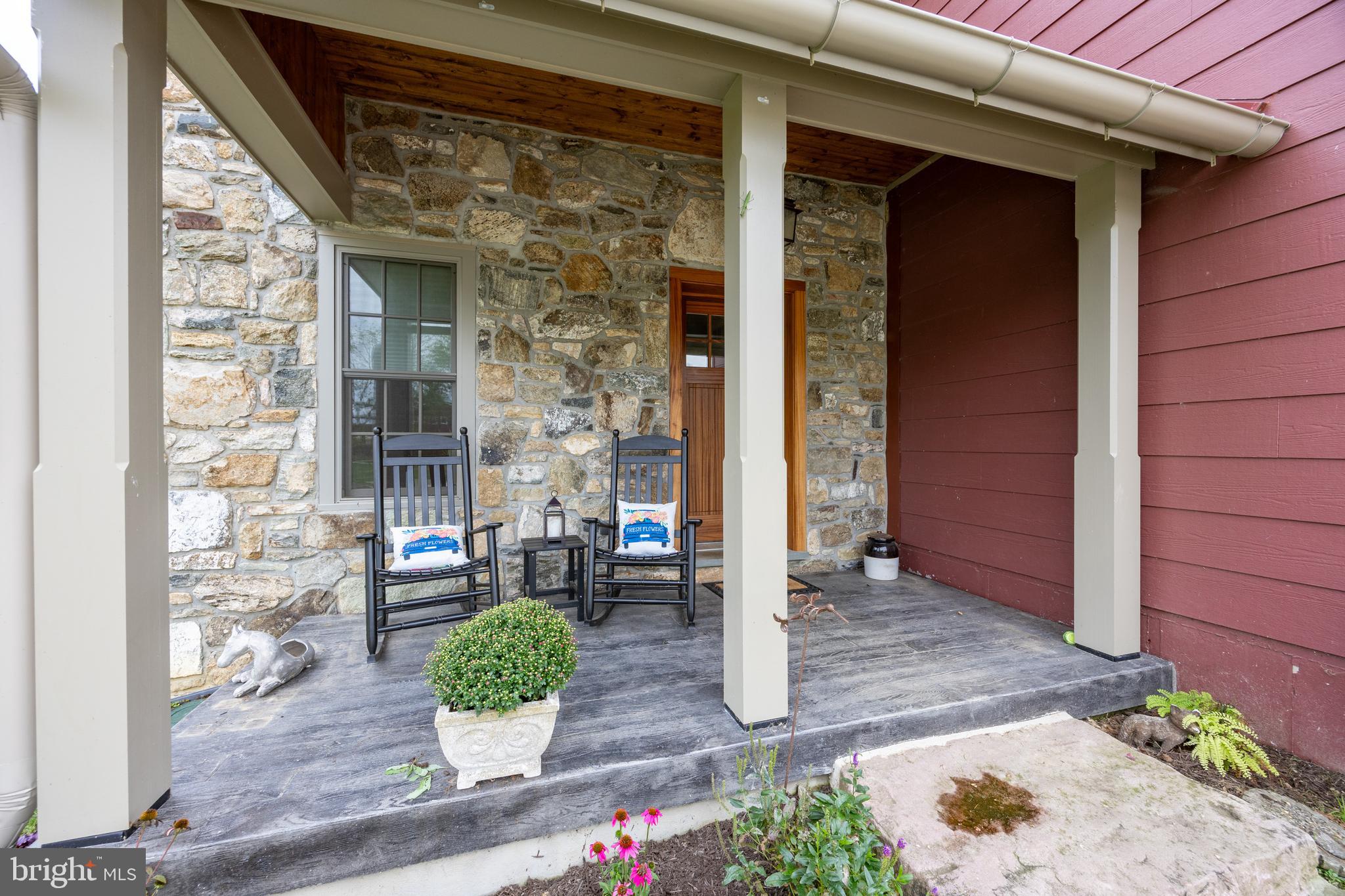 2230 Creek Road Glenmoore, PA 19343 - Photo 82 of 86 a front view of a house with outdoor seating