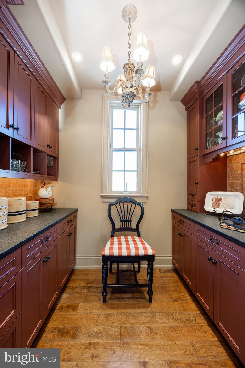 2230 Creek Road Glenmoore, PA 19343 - Photo 9 of 86 a bedroom with a bed and a chandelier