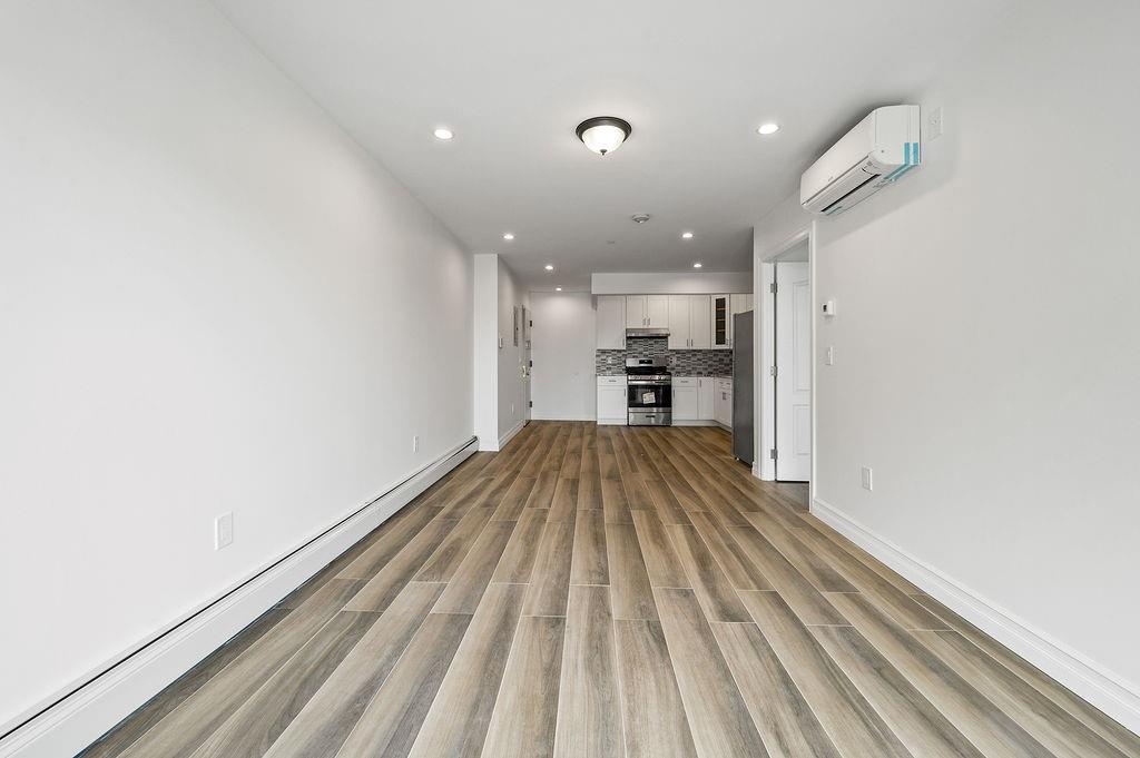 1307 84th Street, Unit 3B Brooklyn, NY 11228 - Photo 6 of 17 a view of kitchen with sink and refrigerator