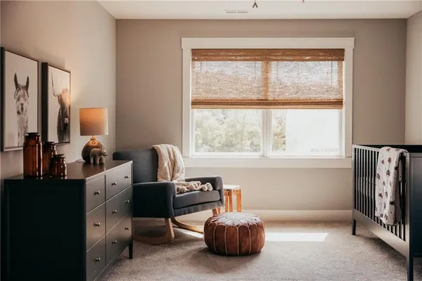 a view of a backyard with table and chairs