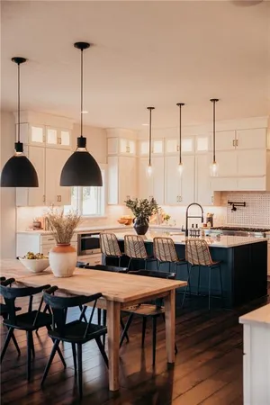 a view of a dining room with furniture
