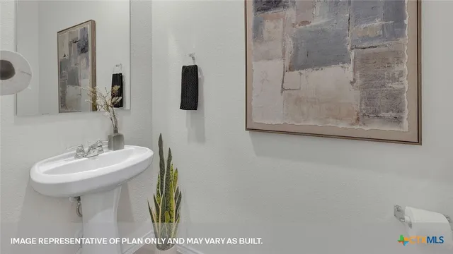 a bathroom with a sink a mirror and shower