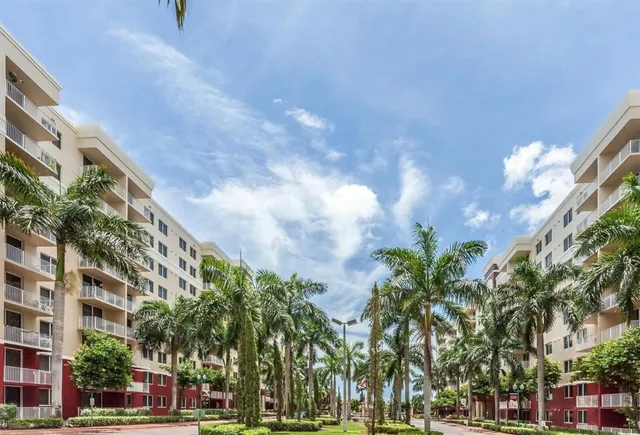 a view of a city with tall buildings