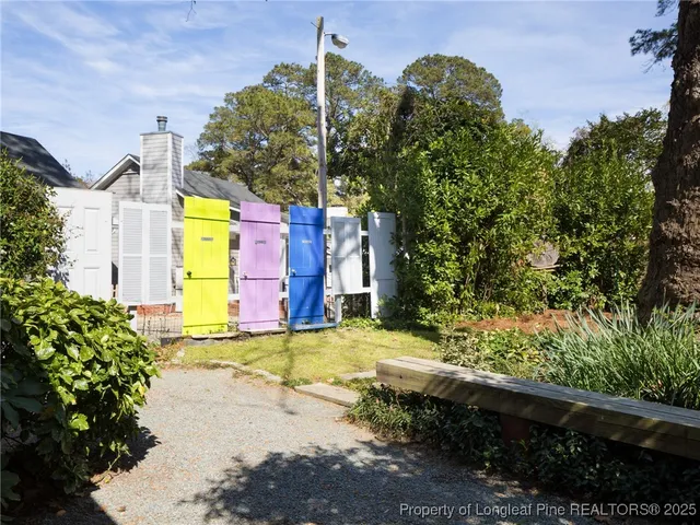a view of a back yard of the house