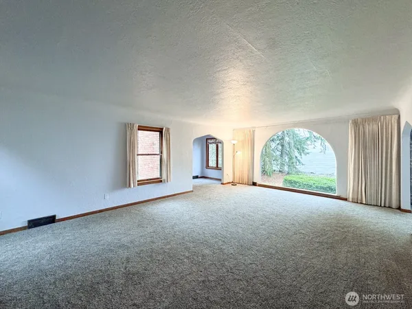 a view of a kitchen with a sink and a window