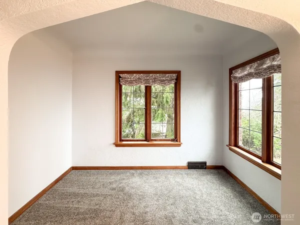 a view of a livingroom from a hallway