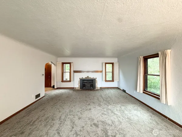 an empty room with windows