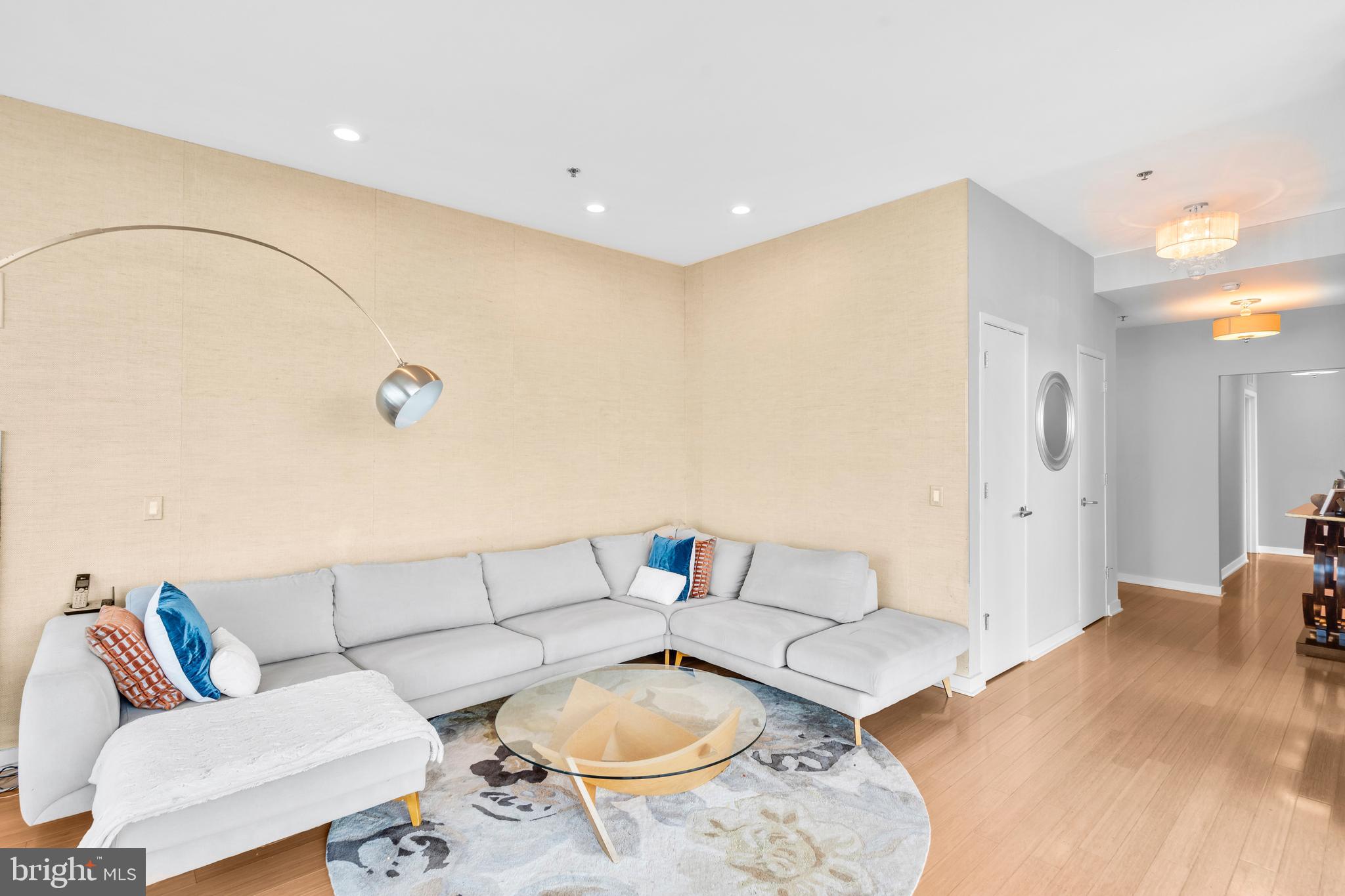 2101 Market Street, Unit PH02 Philadelphia, PA 19103 - Photo 17 of 56 a living room with furniture and a couch