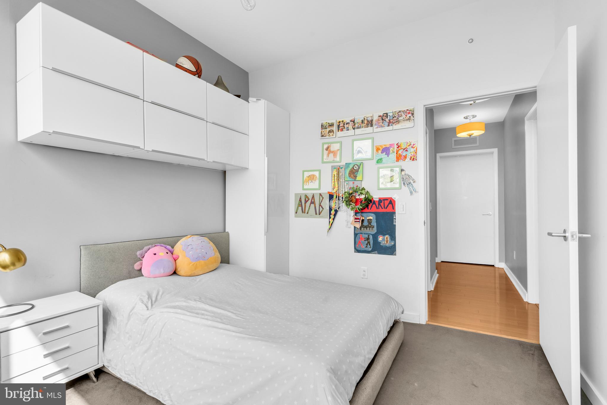 2101 Market Street, Unit PH02 Philadelphia, PA 19103 - Photo 30 of 56 a bedroom with a bed and a window