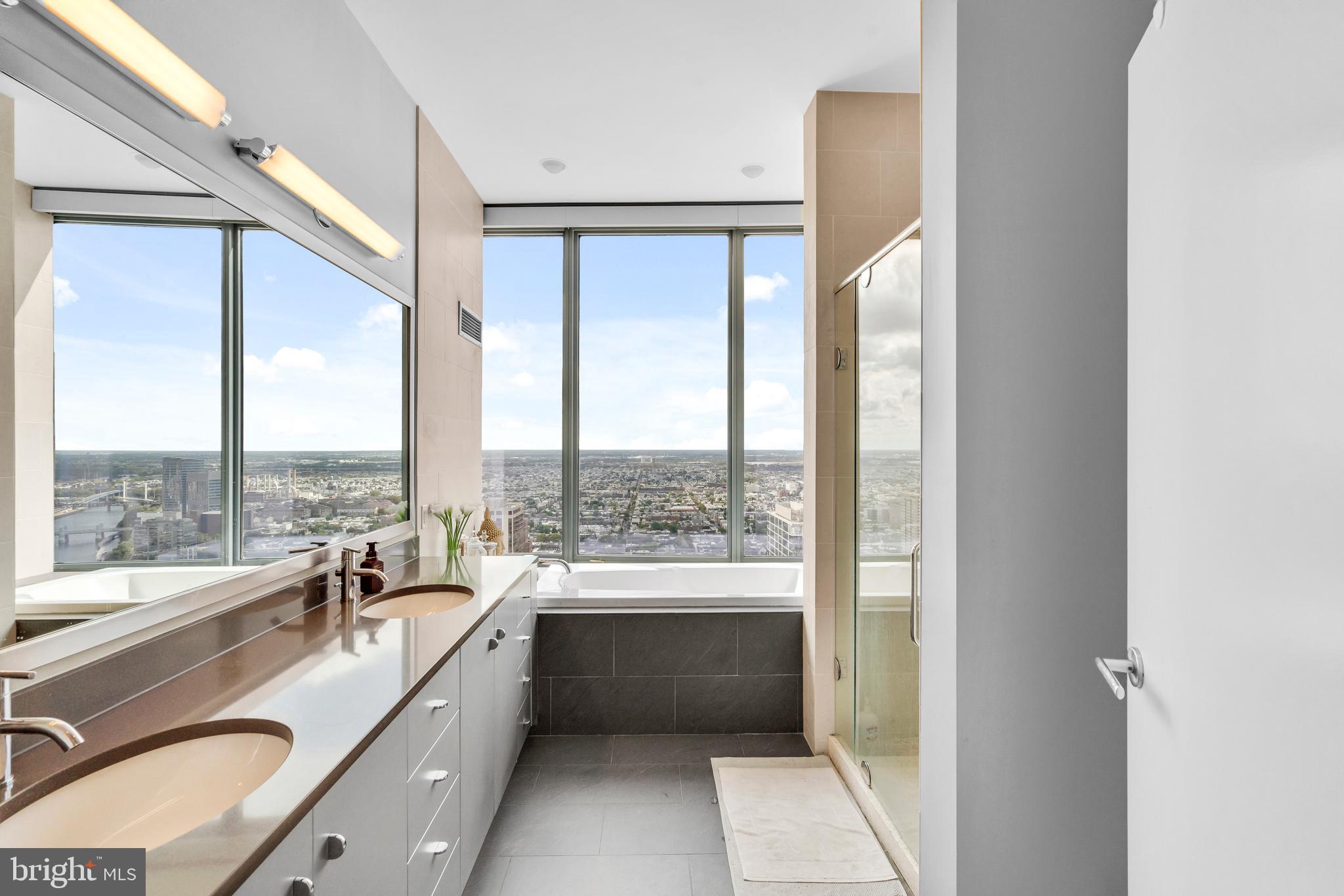 2101 Market Street, Unit PH02 Philadelphia, PA 19103 - Photo 37 of 56 a very nice looking room with a large window