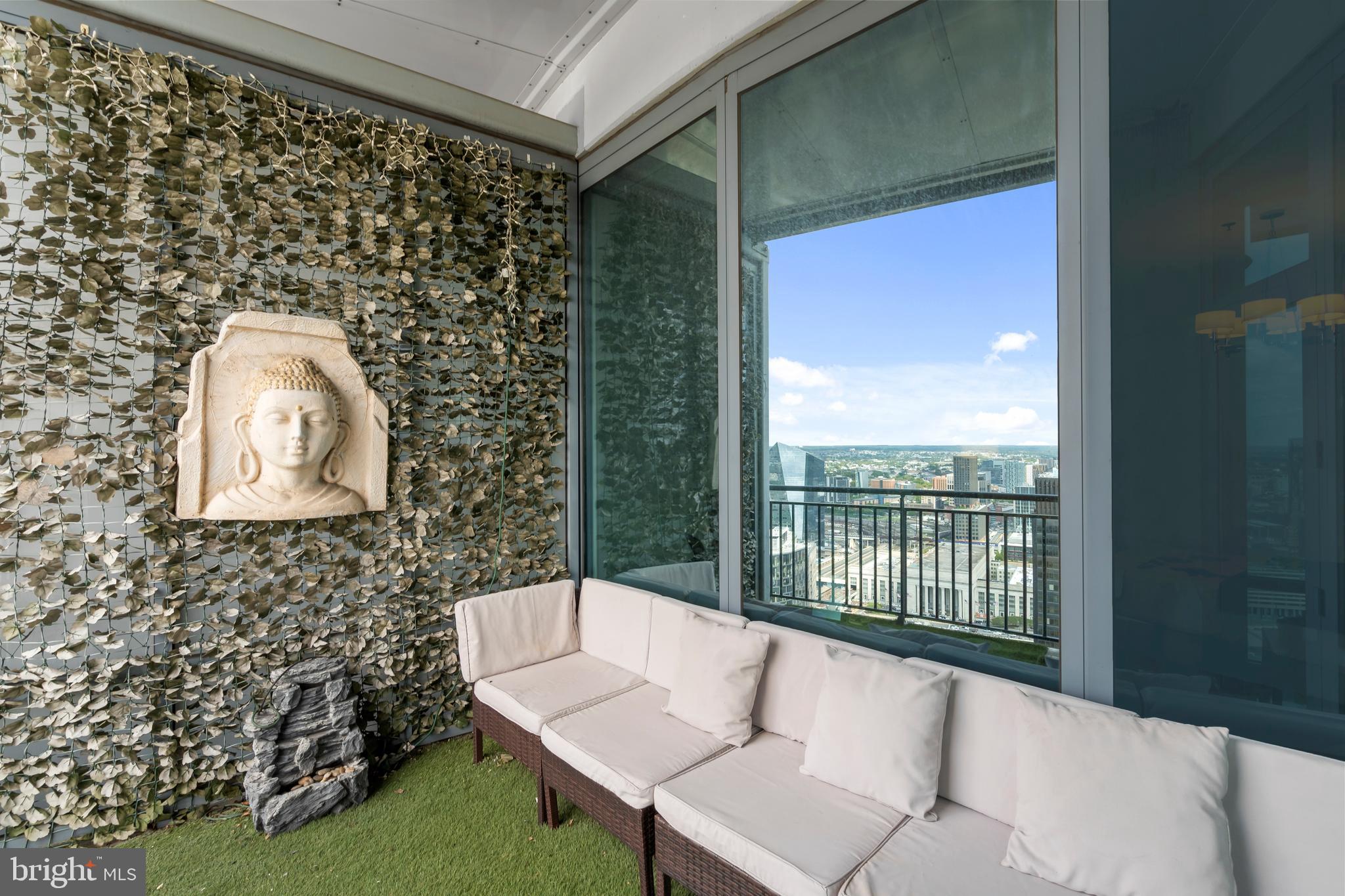 2101 Market Street, Unit PH02 Philadelphia, PA 19103 - Photo 39 of 56 a view of balcony with a swing chair