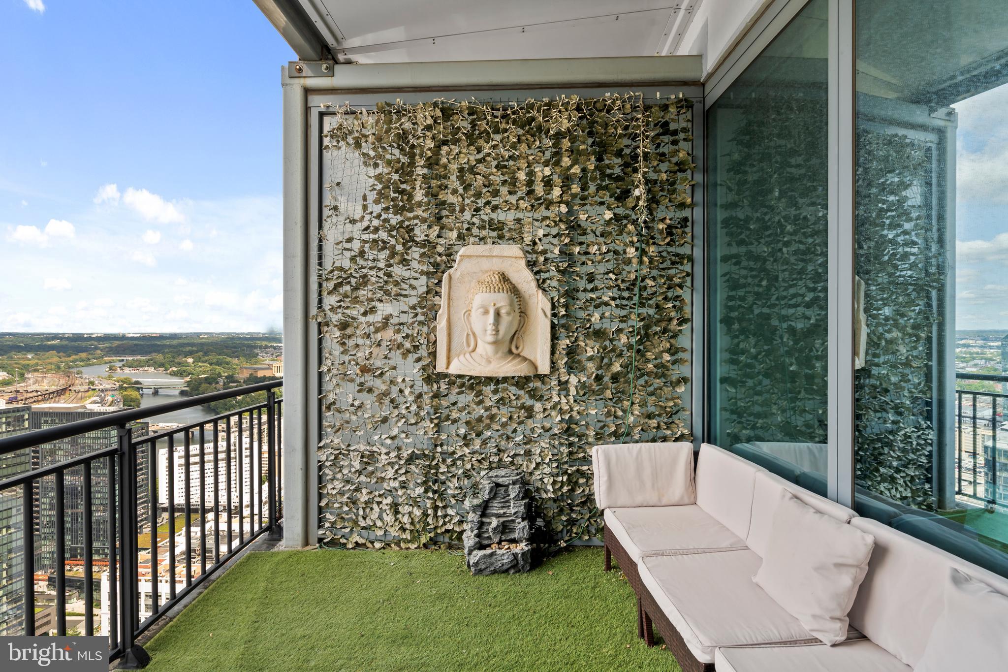 2101 Market Street, Unit PH02 Philadelphia, PA 19103 - Photo 40 of 56 a view of a balcony with a garden