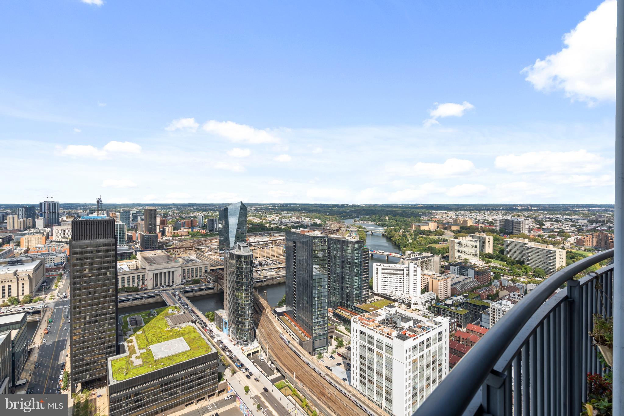 2101 Market Street, Unit PH02 Philadelphia, PA 19103 - Photo 42 of 56 a view of a balcony with an ocean view