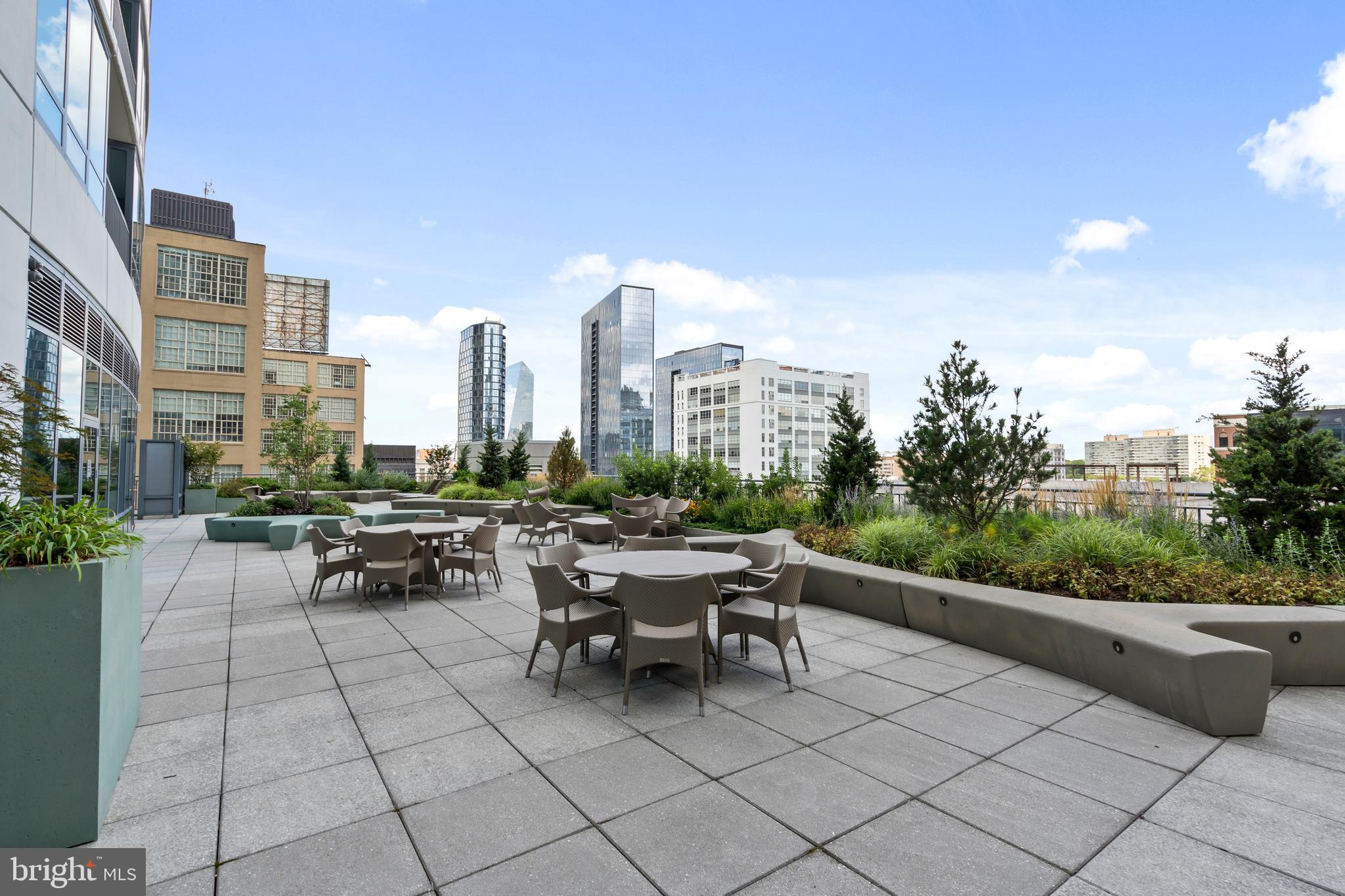 2101 Market Street, Unit PH02 Philadelphia, PA 19103 - Photo 48 of 56 a view of a terrace with chairs and a potted plant