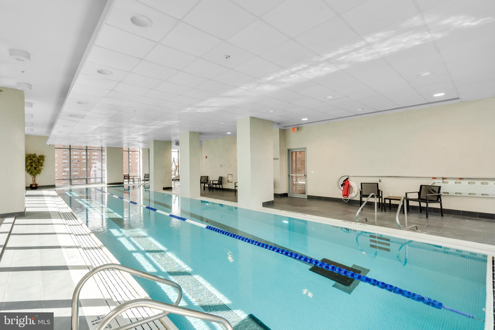 2101 Market Street, Unit PH02 Philadelphia, PA 19103 - Photo 50 of 56 a room with lots of table and chairs