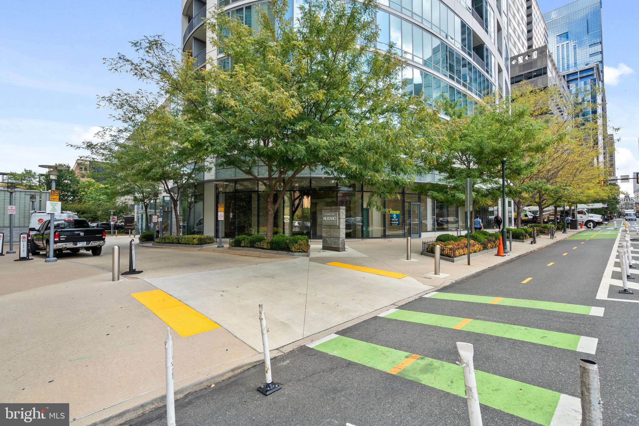 2101 Market Street, Unit PH02 Philadelphia, PA 19103 - Photo 55 of 56 a view of a swimming pool with a lounge chair and front of road