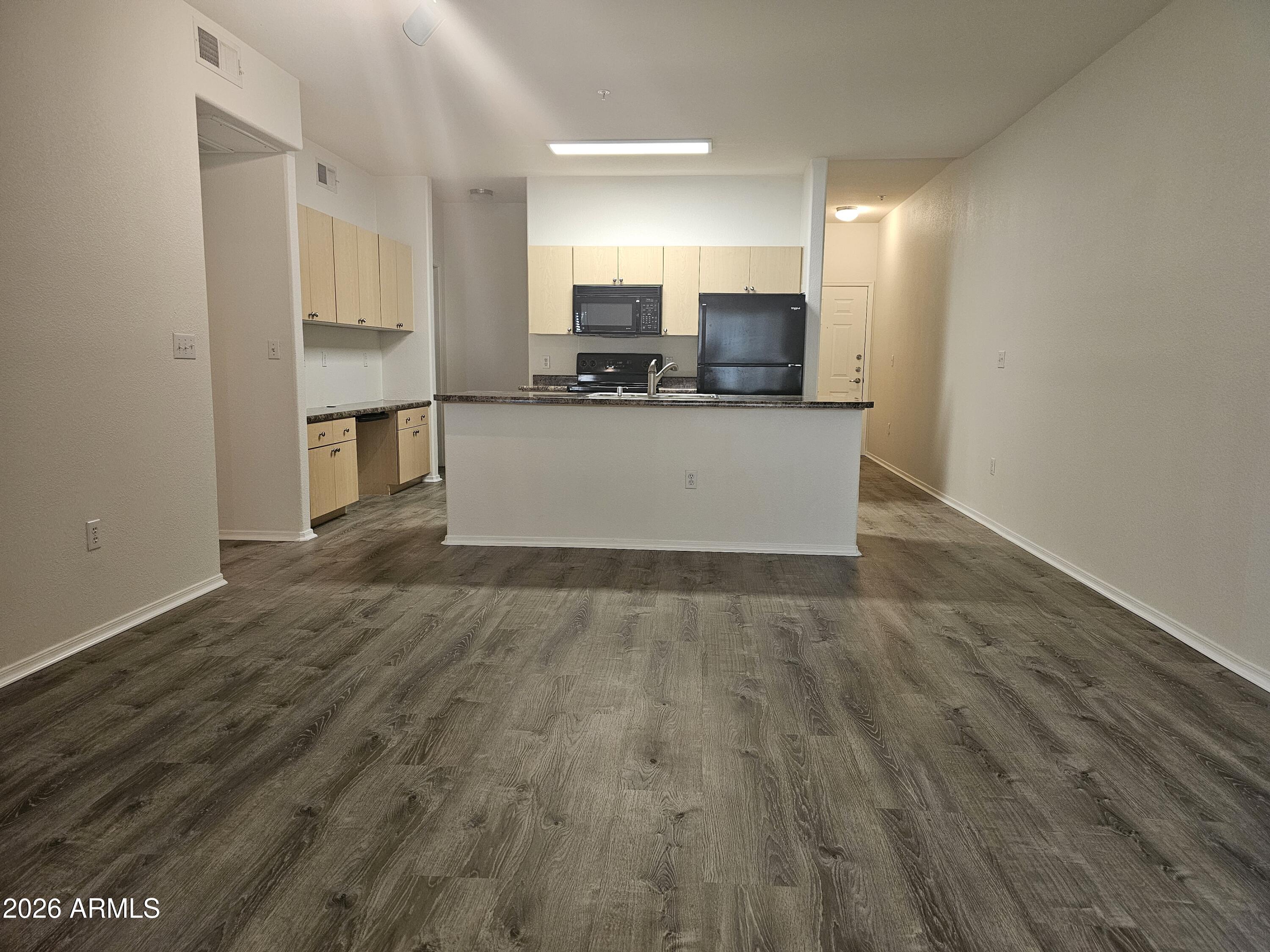 18416 North Cave Creek Road, Unit 1075 Phoenix, AZ 85032 - Photo 4 of 14 a view of kitchen with cabinets