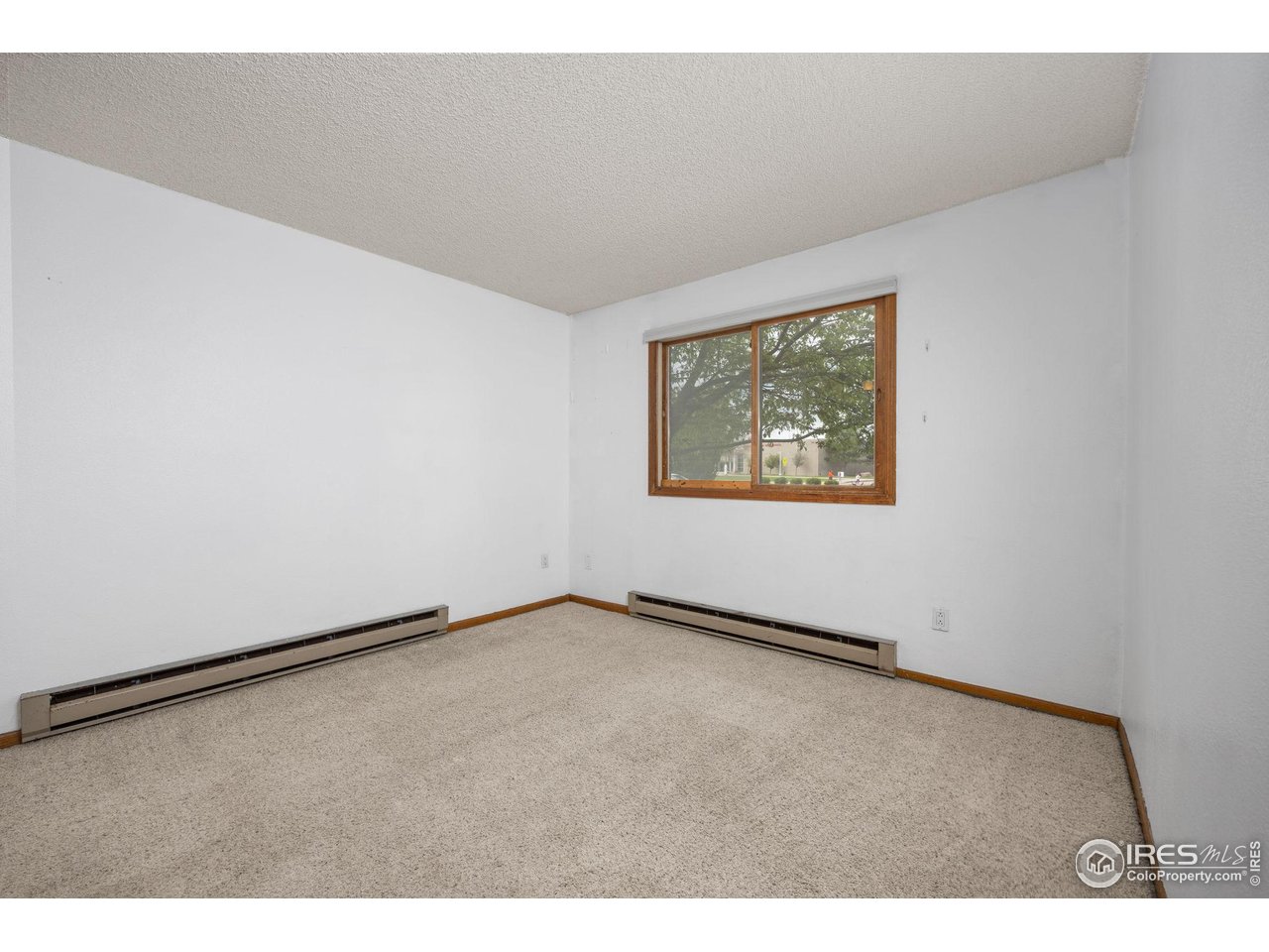 1231 West Swallow Road, Unit 314 Fort Collins, CO 80526 - Photo 14 of 29 a view of an empty room