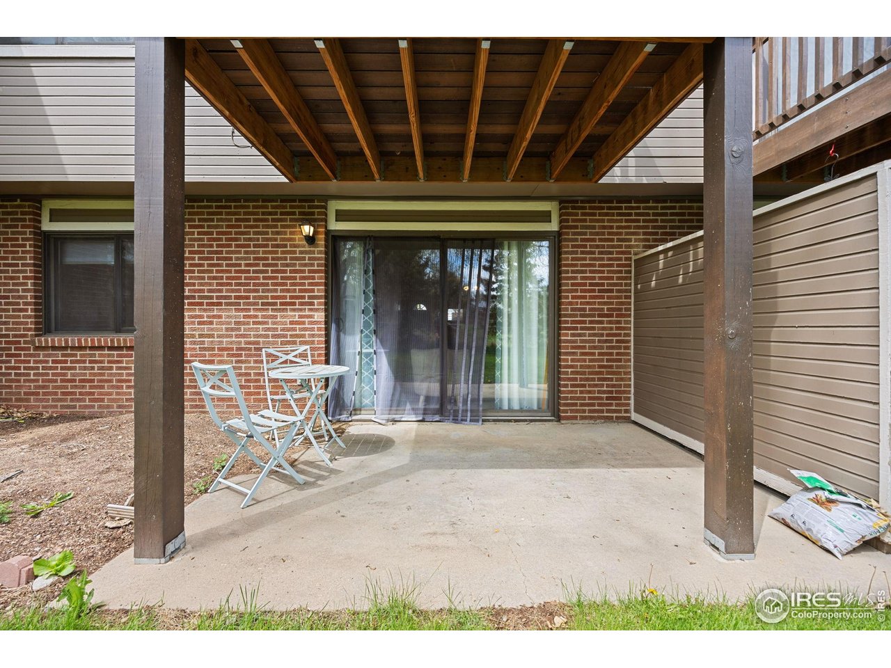 1231 West Swallow Road, Unit 314 Fort Collins, CO 80526 - Photo 20 of 29 a front view of a house with basket ball outdoor seating