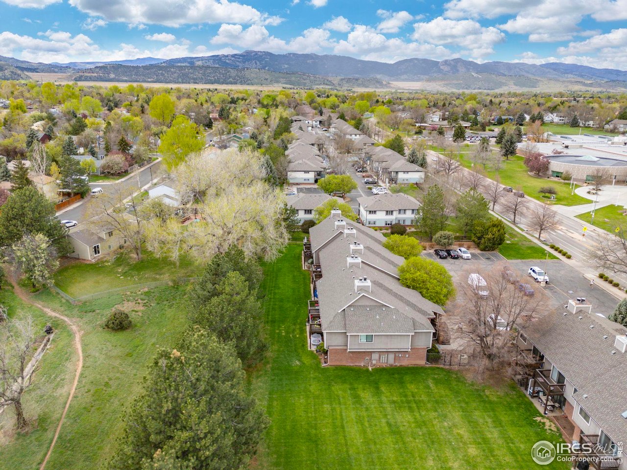 1231 West Swallow Road, Unit 314 Fort Collins, CO 80526 - Photo 22 of 29 an aerial view of residential houses with yard