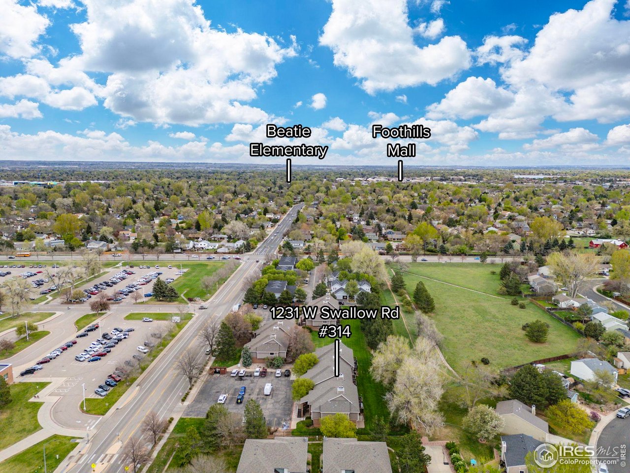 1231 West Swallow Road, Unit 314 Fort Collins, CO 80526 - Photo 23 of 29 a view of a city with an ocean