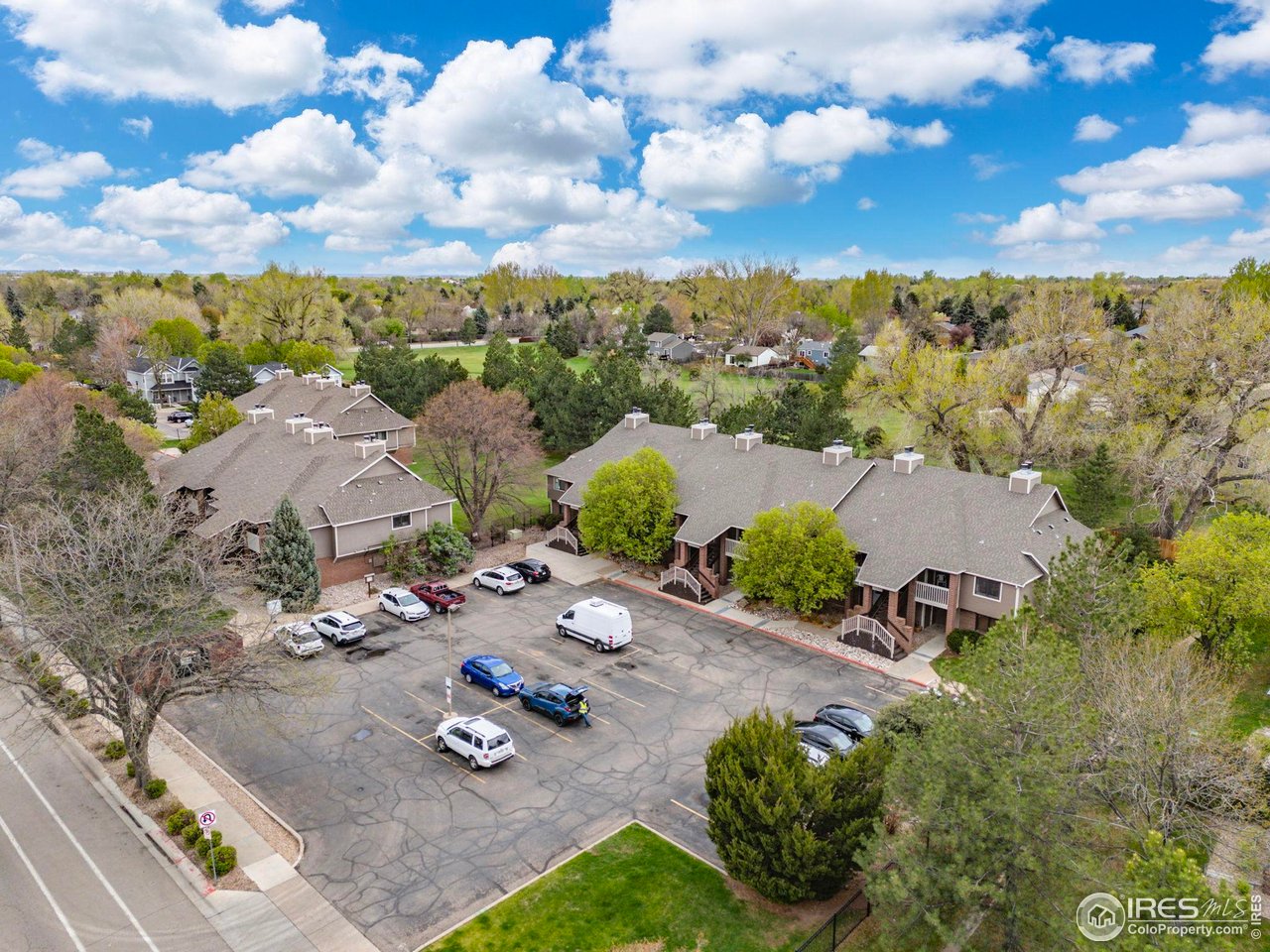 1231 West Swallow Road, Unit 314 Fort Collins, CO 80526 - Photo 26 of 29 an aerial view of a houses with yard
