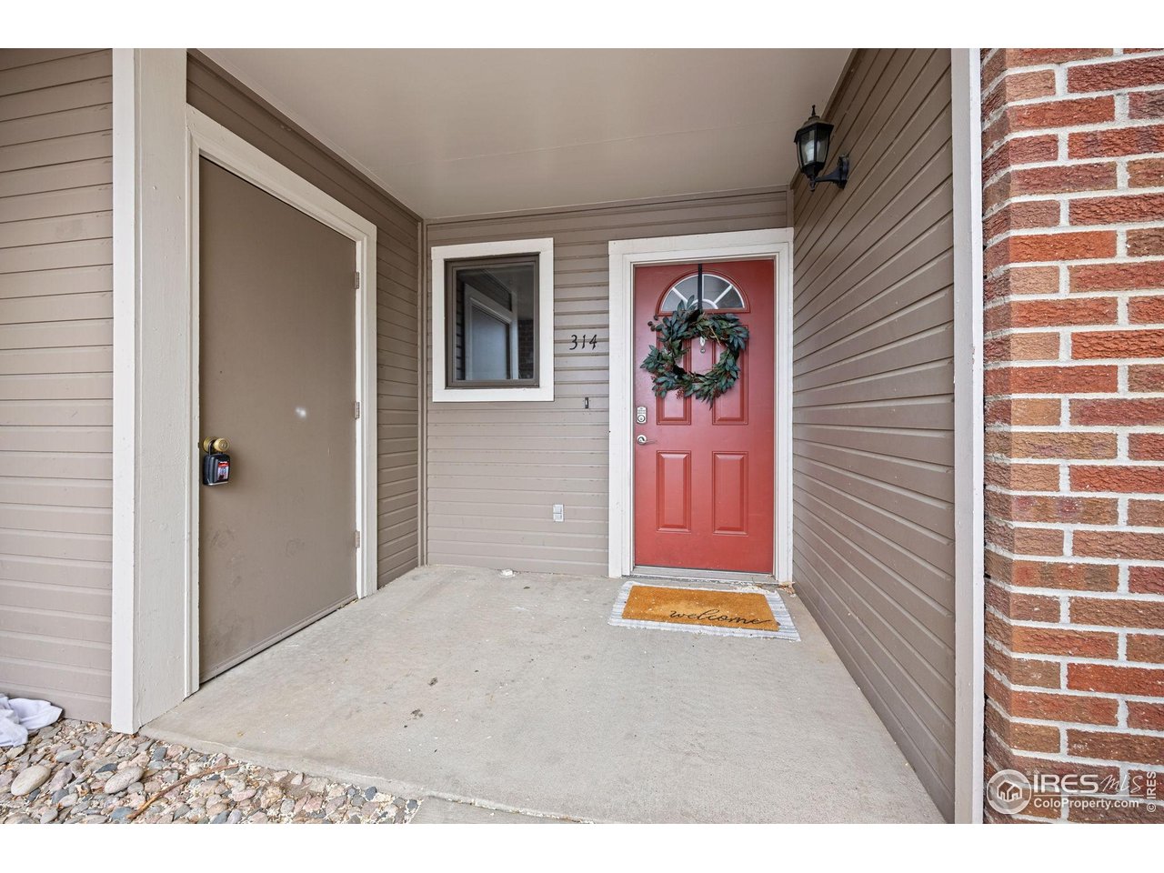 1231 West Swallow Road, Unit 314 Fort Collins, CO 80526 - Photo 4 of 29 a view of an front door