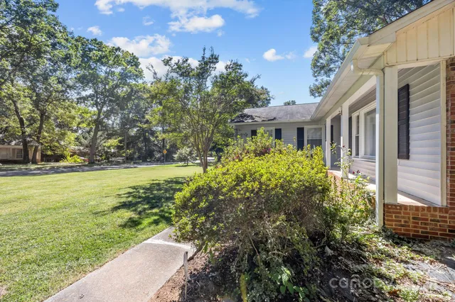 a view of a house with a garden
