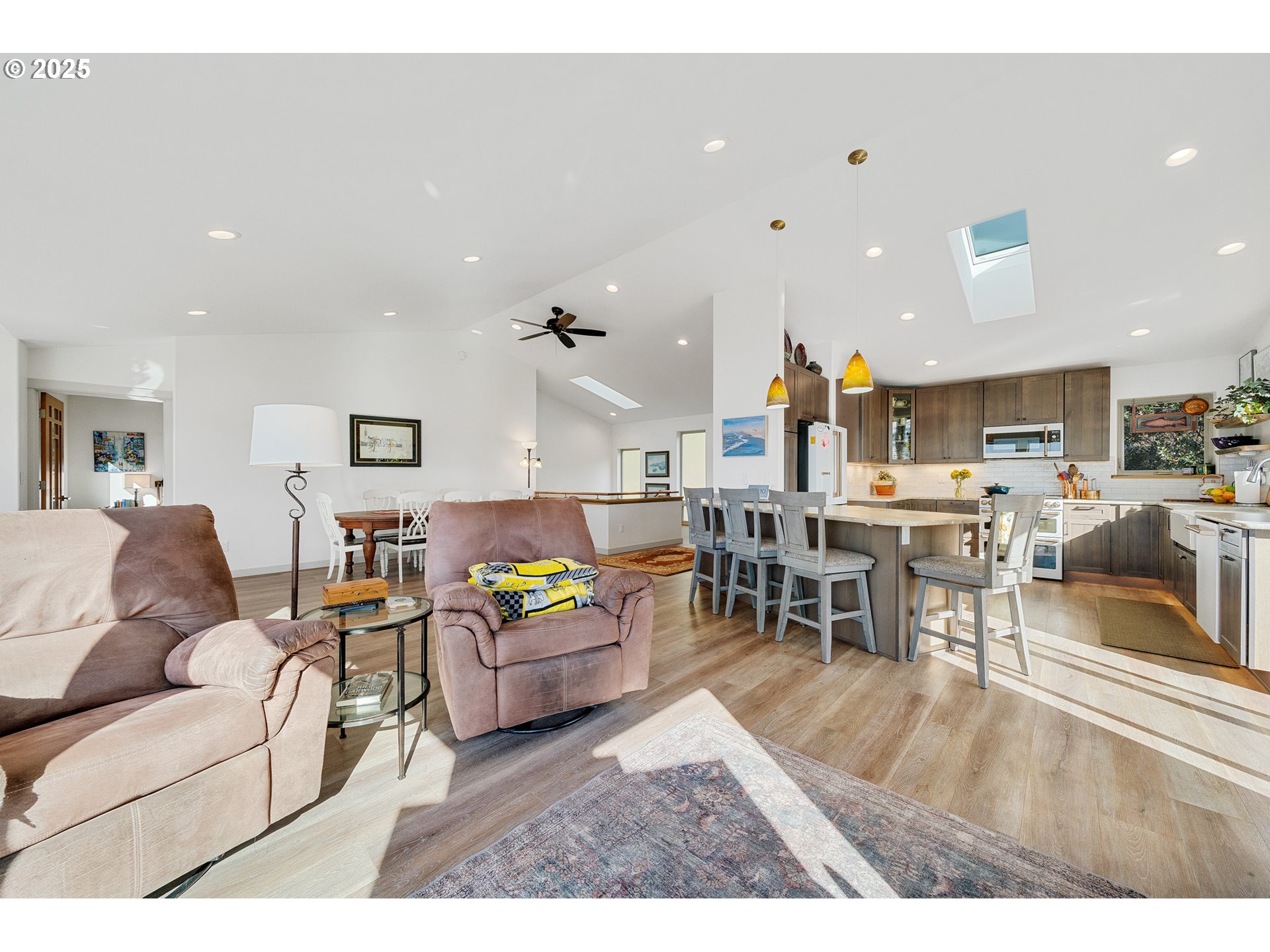 9065 8th Street Bay City, OR 97107 - Photo 12 of 48 a living room with furniture and kitchen view