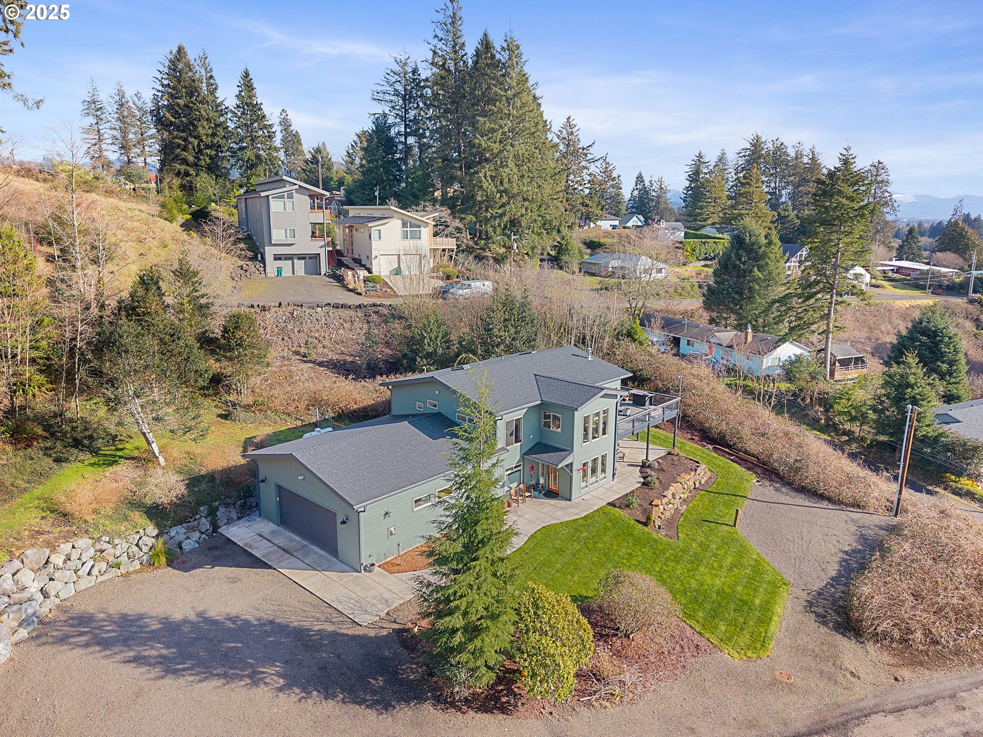 9065 8th Street Bay City, OR 97107 - Photo 2 of 48 an aerial view of a house with a yard