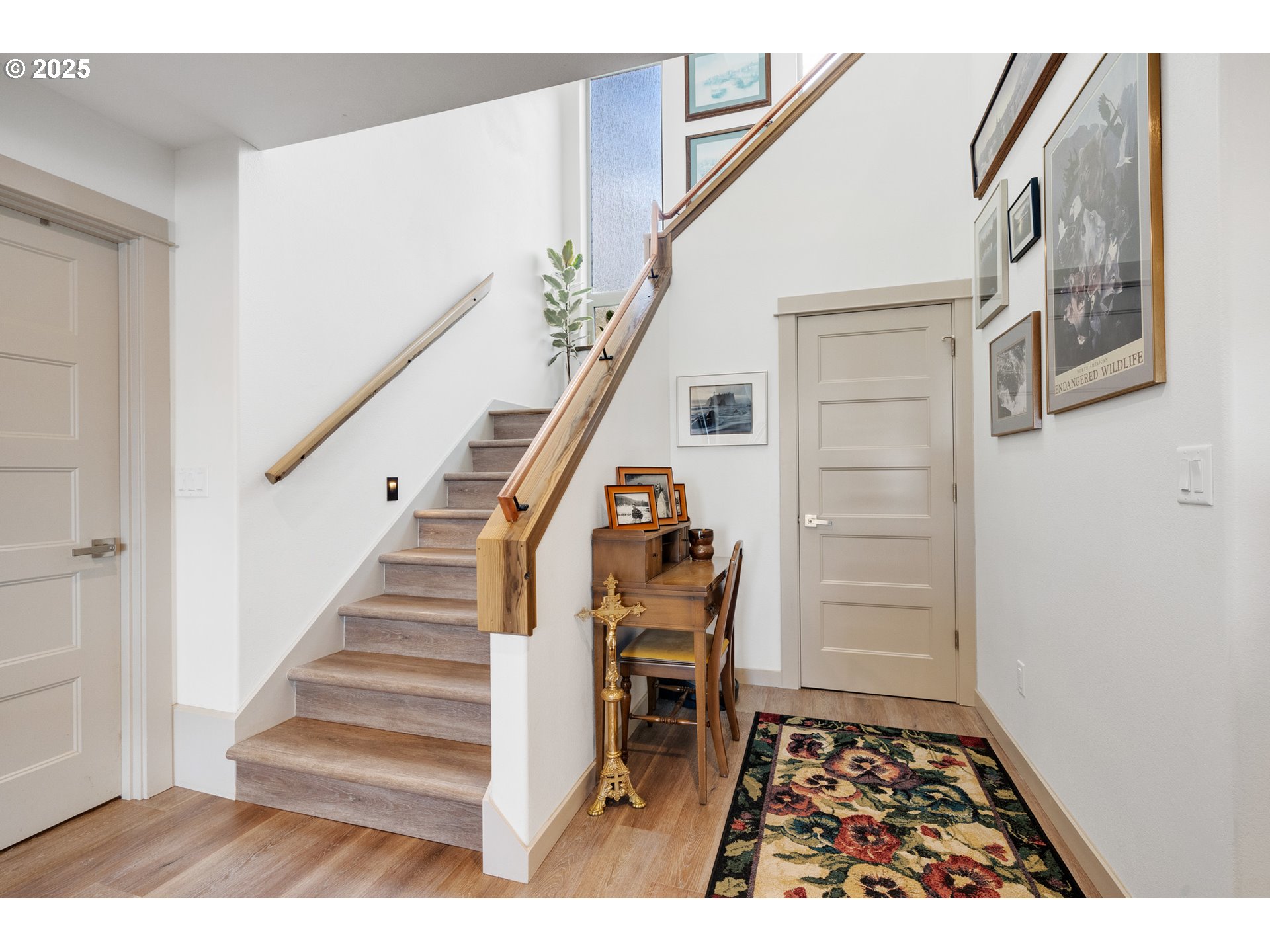9065 8th Street Bay City, OR 97107 - Photo 31 of 48 a view of entryway and hall with wooden floor