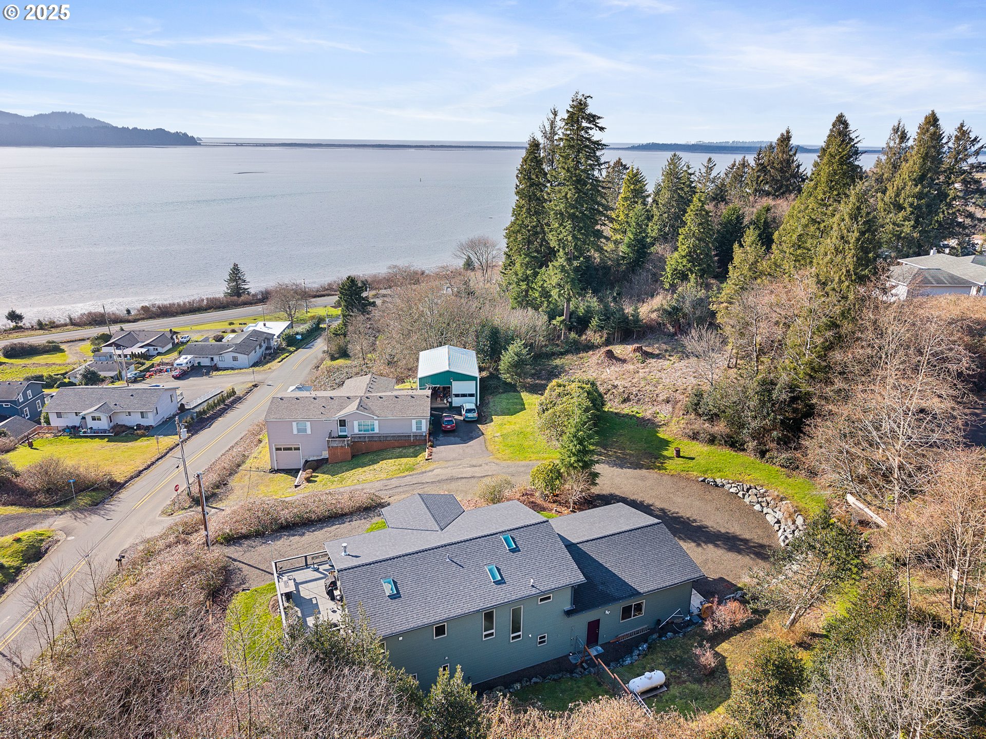 9065 8th Street Bay City, OR 97107 - Photo 48 of 48 an aerial view of a house with a swimming pool