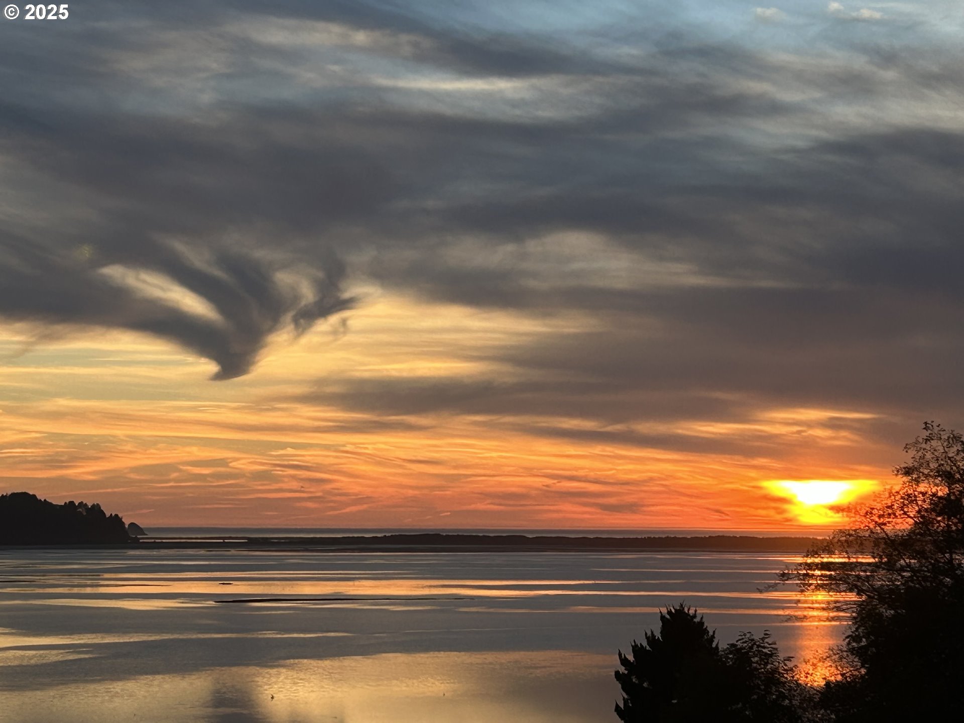 9065 8th Street Bay City, OR 97107 - Photo 6 of 48 a view of an ocean and beach